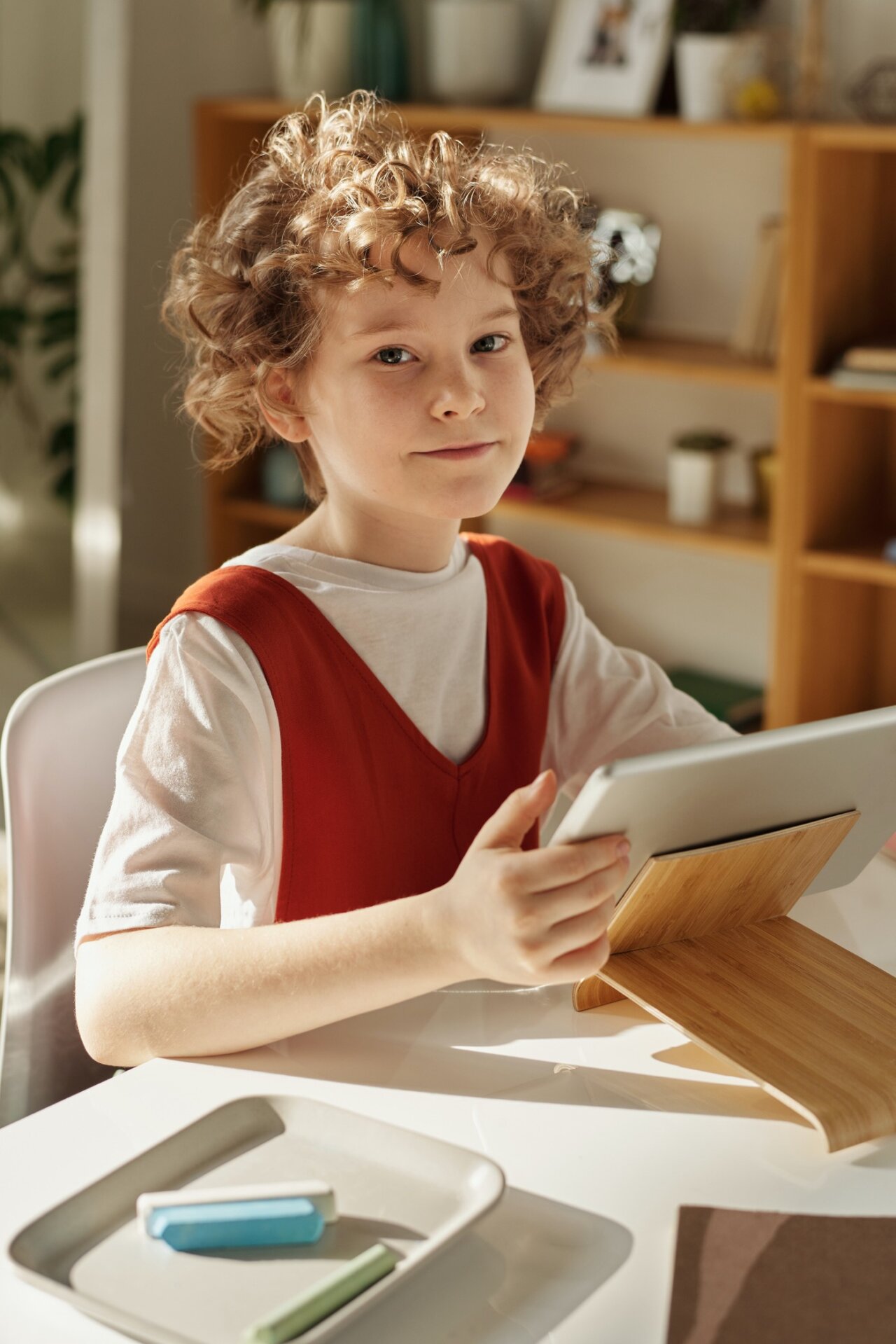 Student working at home on an iPad